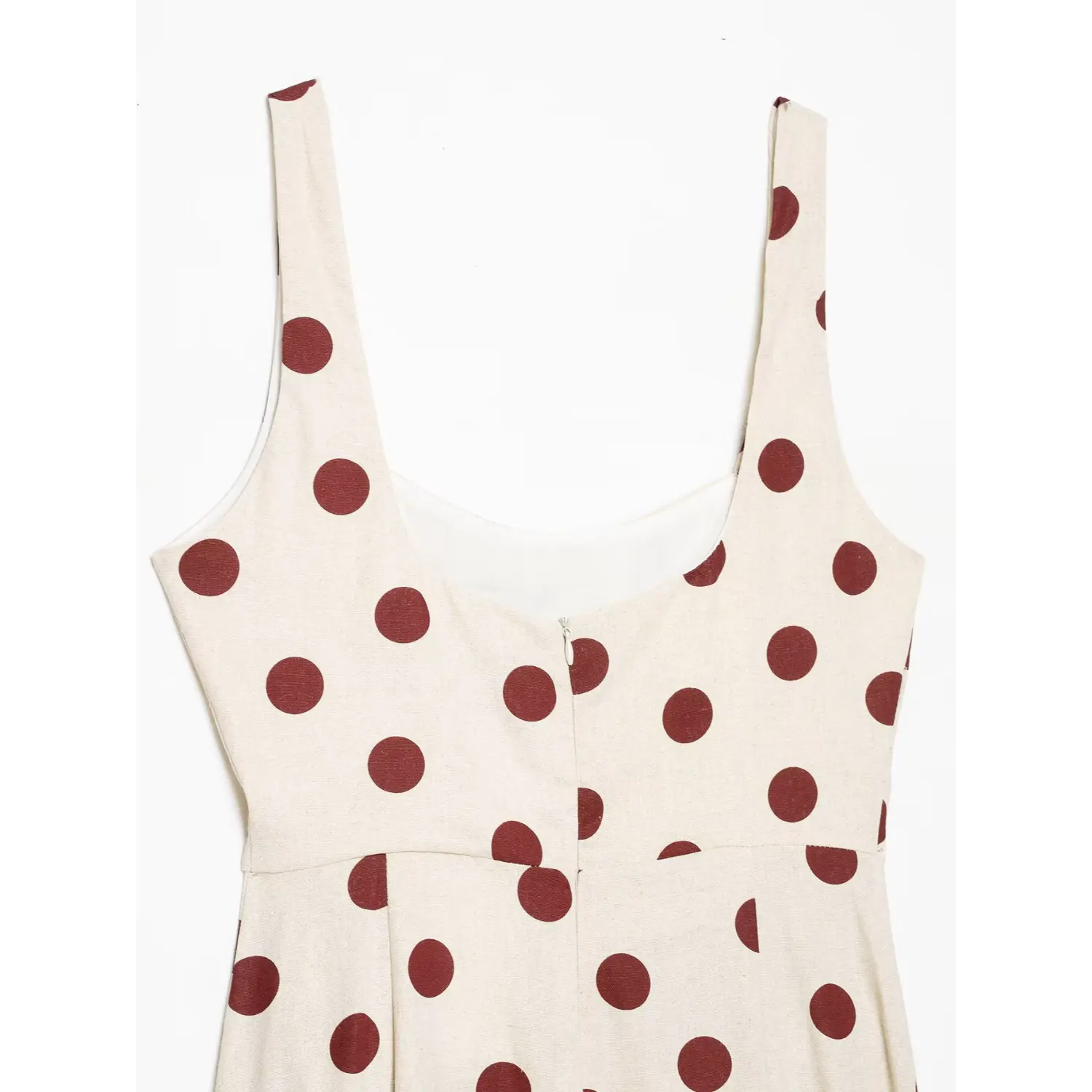 Close-up back upper shot, square back neck and concealed zipper of off-white wine red polka dot cami dress