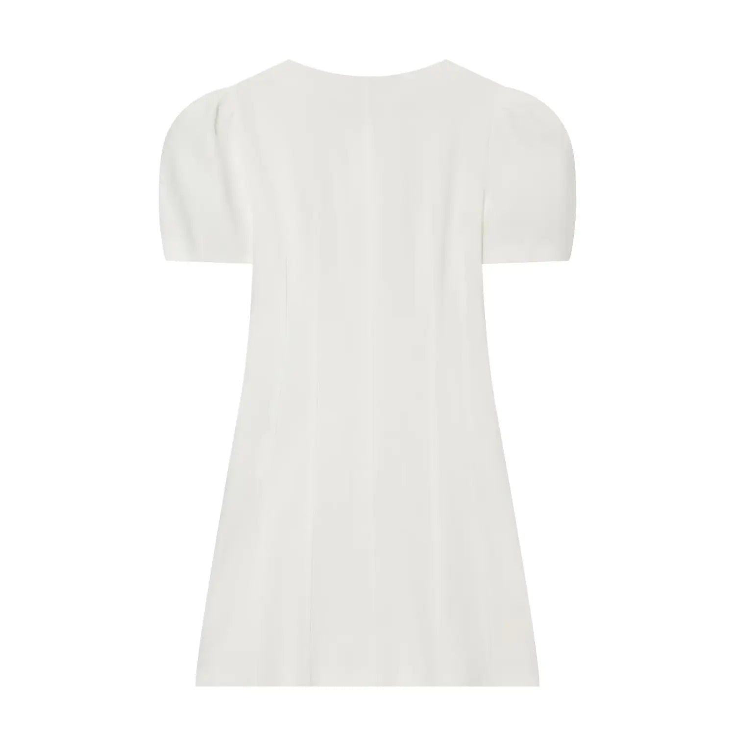 Close-up of the side seam stitching and hemline on the off-white crepe dress