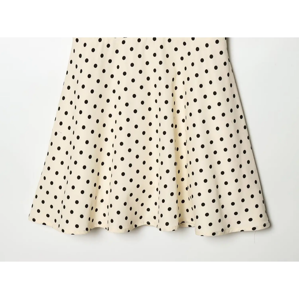 Off‑white black polka dot dress flared a‑line skirt overview,flowing mini skirt silhouette