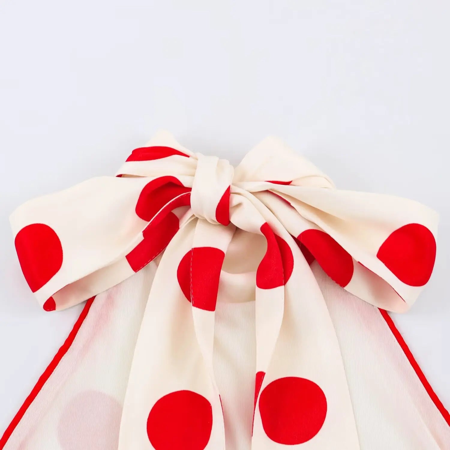 Close‑up of large decorative back bow knot detail
