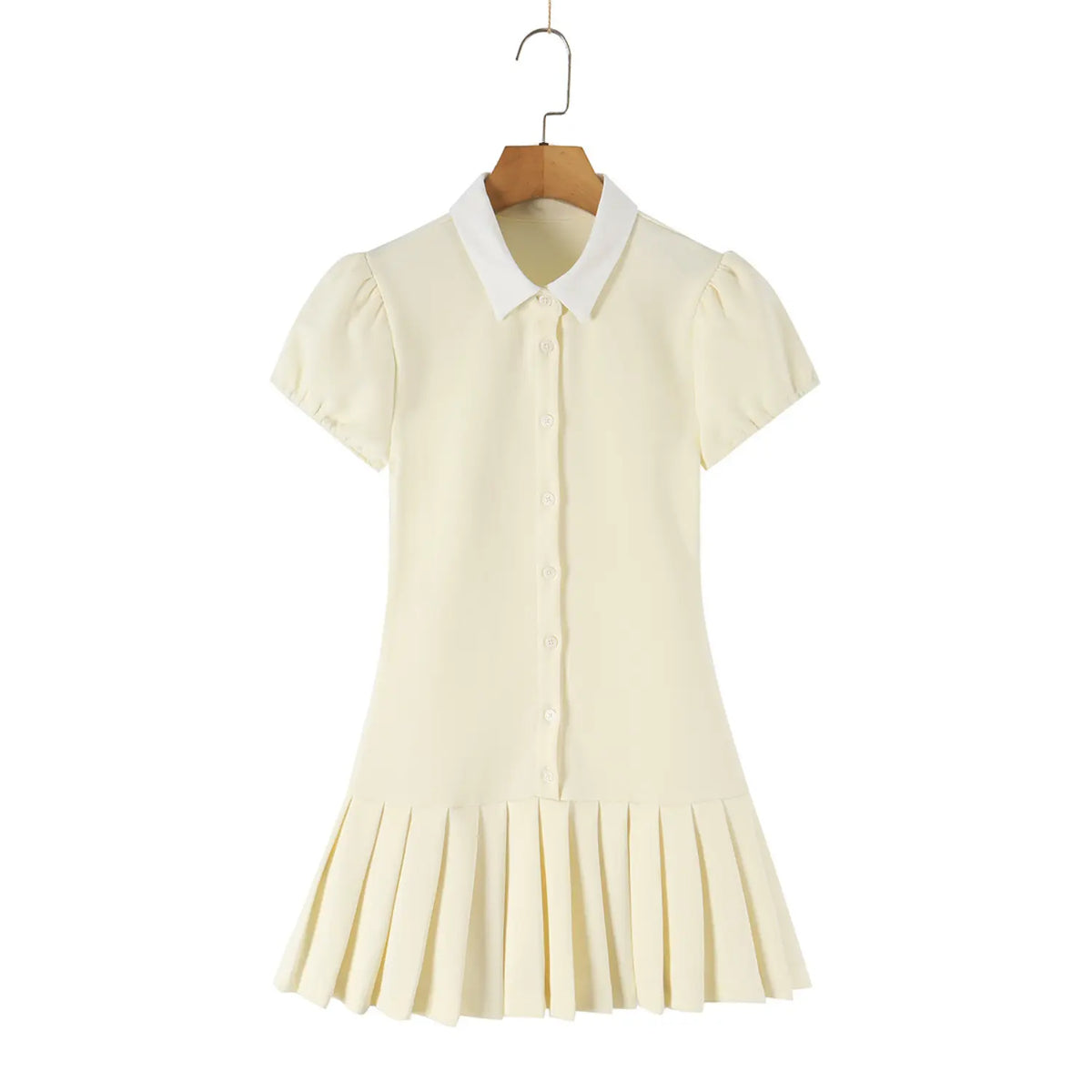 Offwhite mini dress hanging on wooden hanger, white collar, puff sleeves and pleated hem