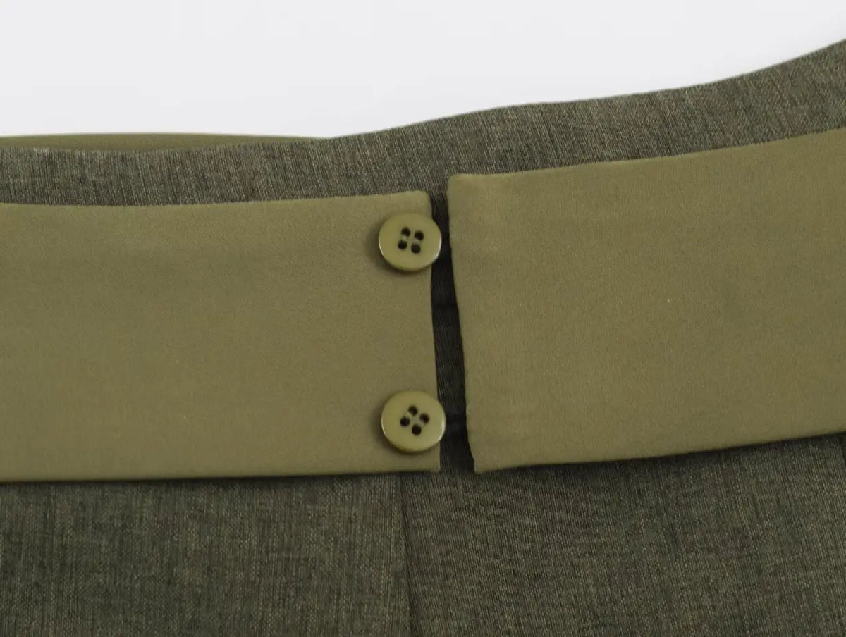 Macro close-up of back waistband buttons