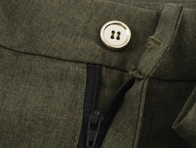 Macro close-up of metal waistband button and zipper