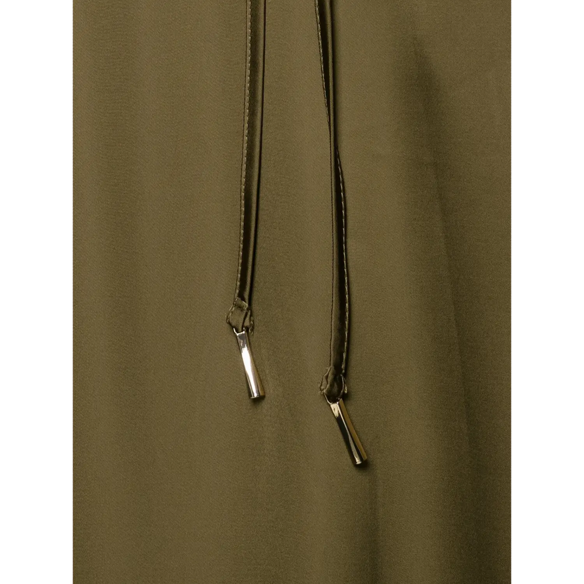 Close-up of silver metal aglet tips on drawstring