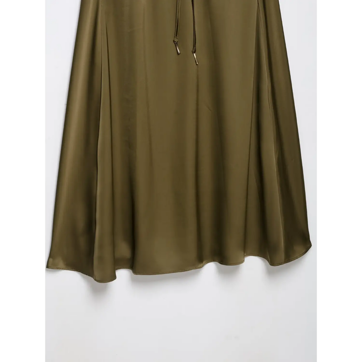 Close-up of flowing skirt drape and hem