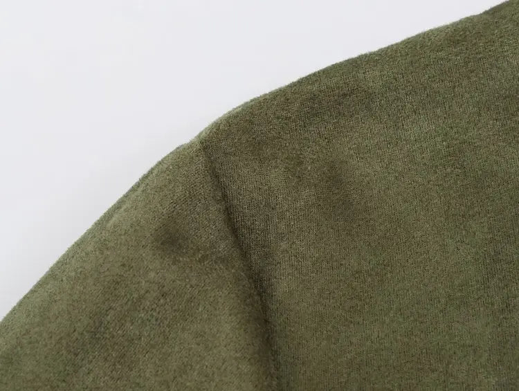 Close-up of shoulder seam and suede texture