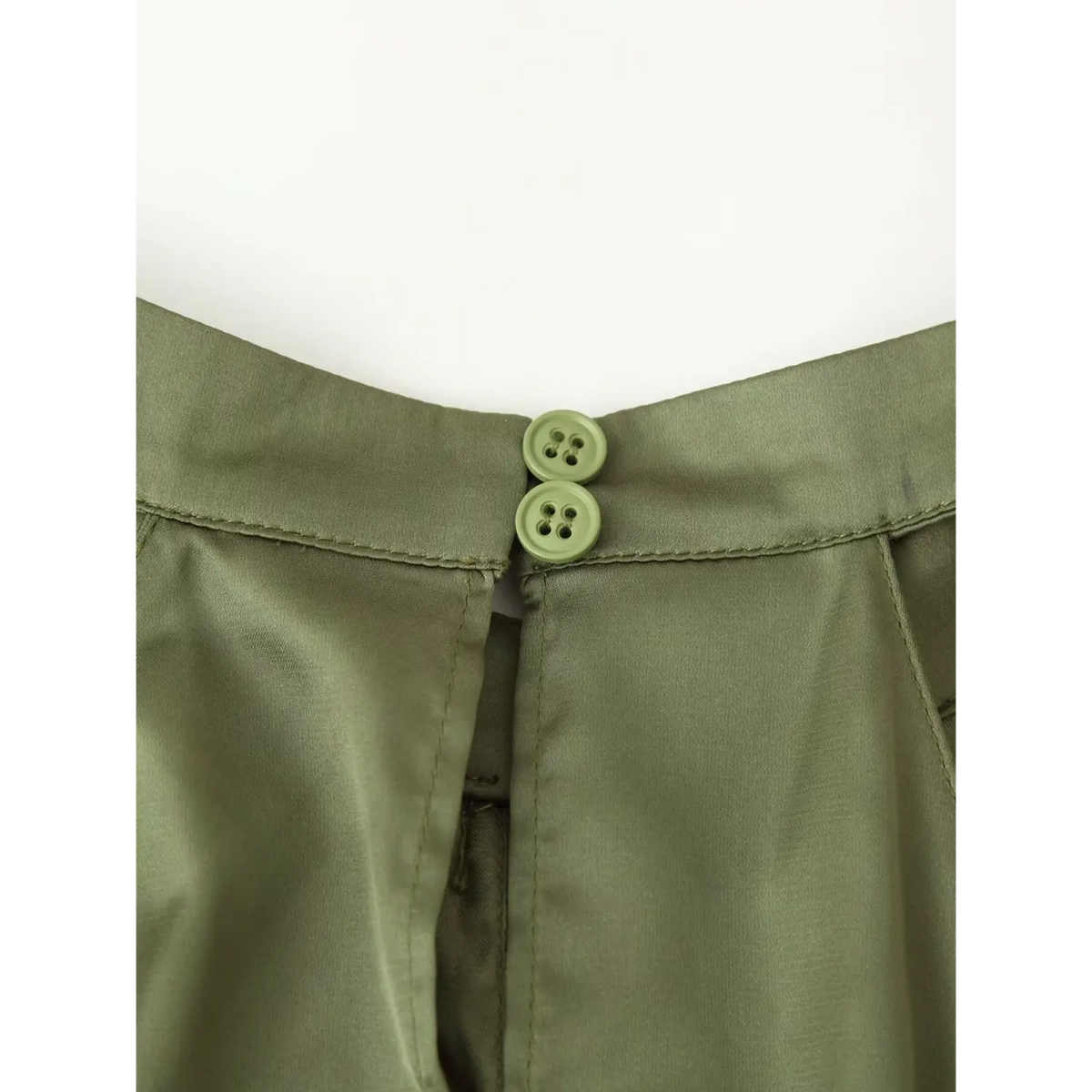 Close-up of neck button closure