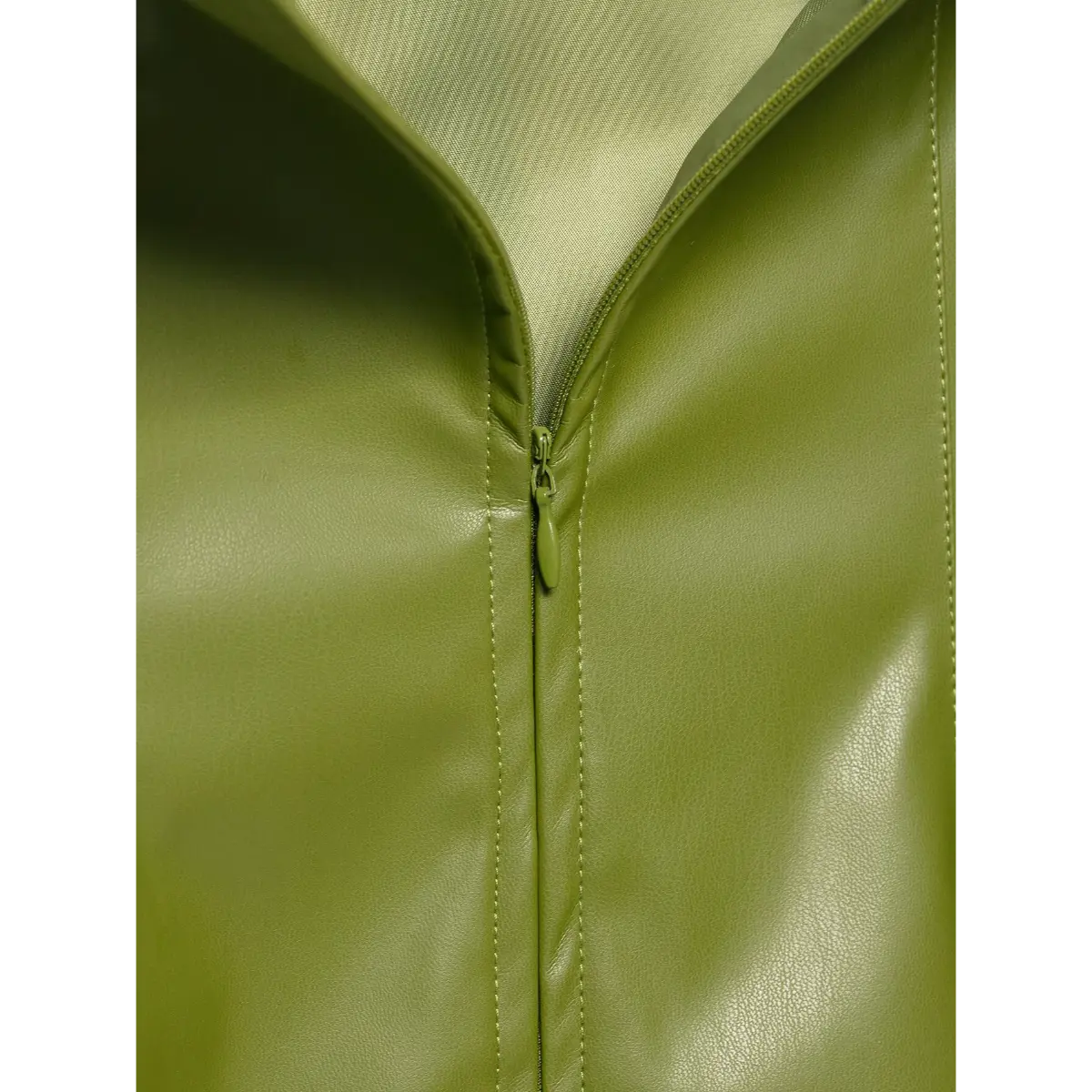 Close-up shot of the back zipper on an olive green faux-leather strapless dress, showing the matching zipper pull and satin lining.