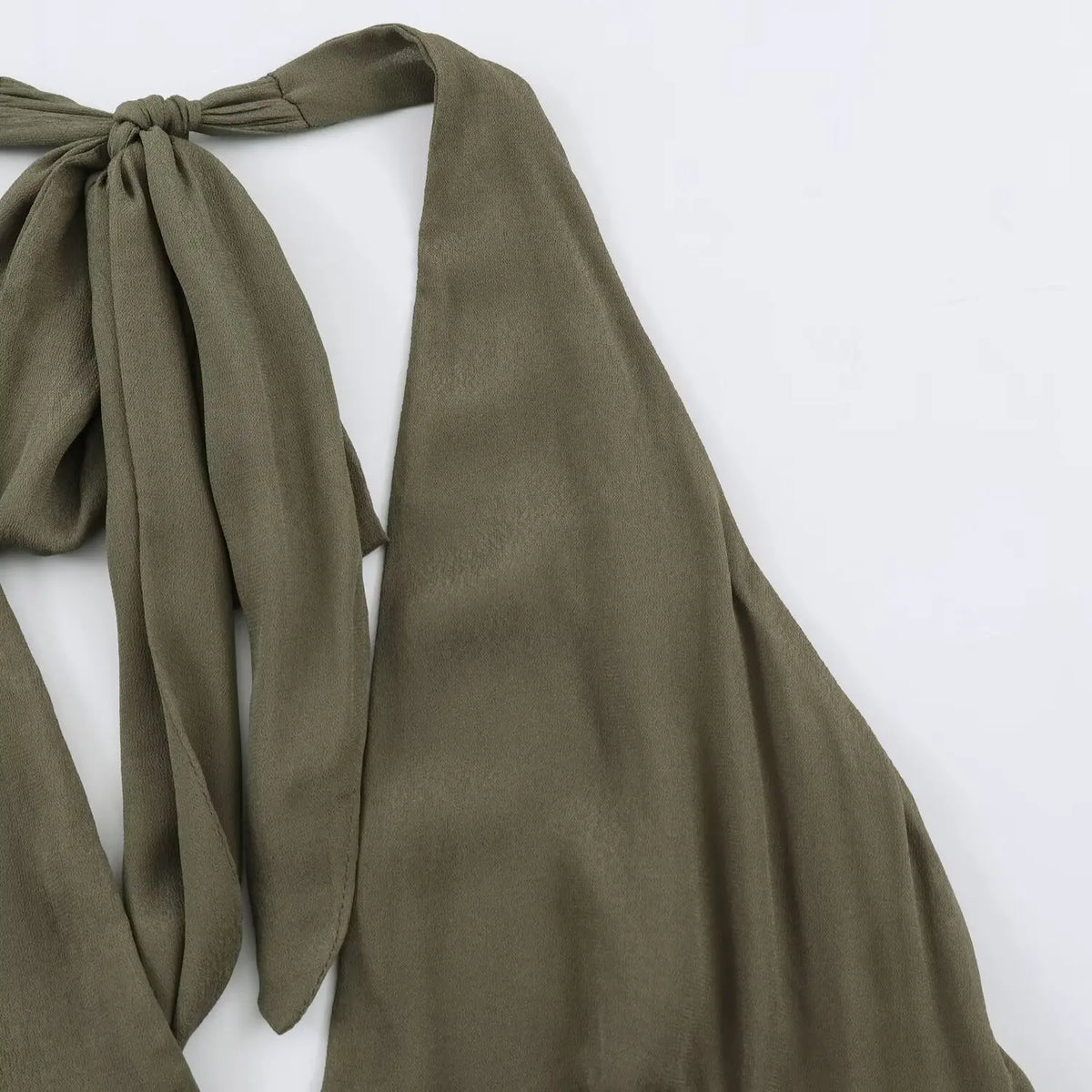 Close-up of halter strap and fabric