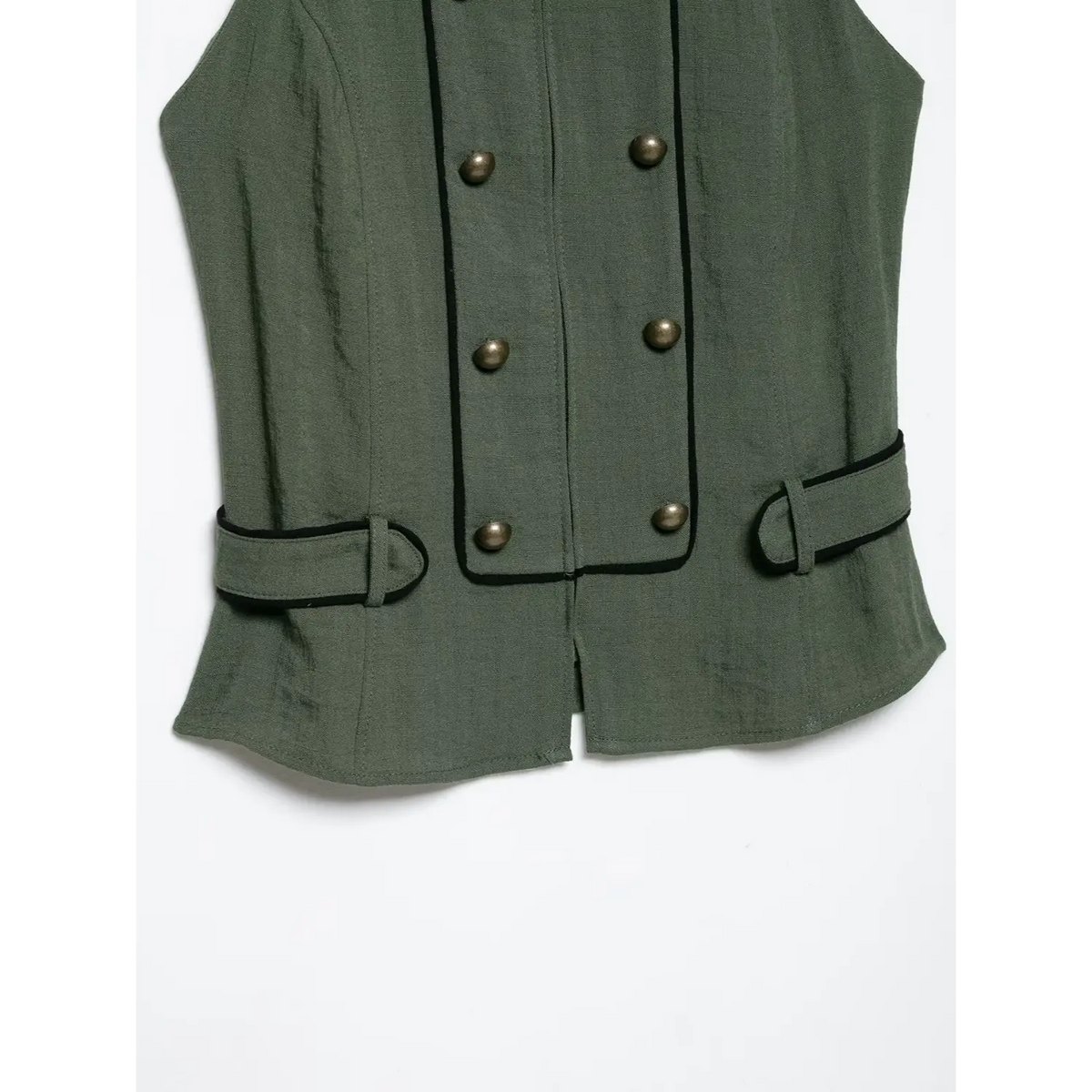 Lower front closeup of olive green halter vest, double breasted metal buttons and side waist buckle decoration