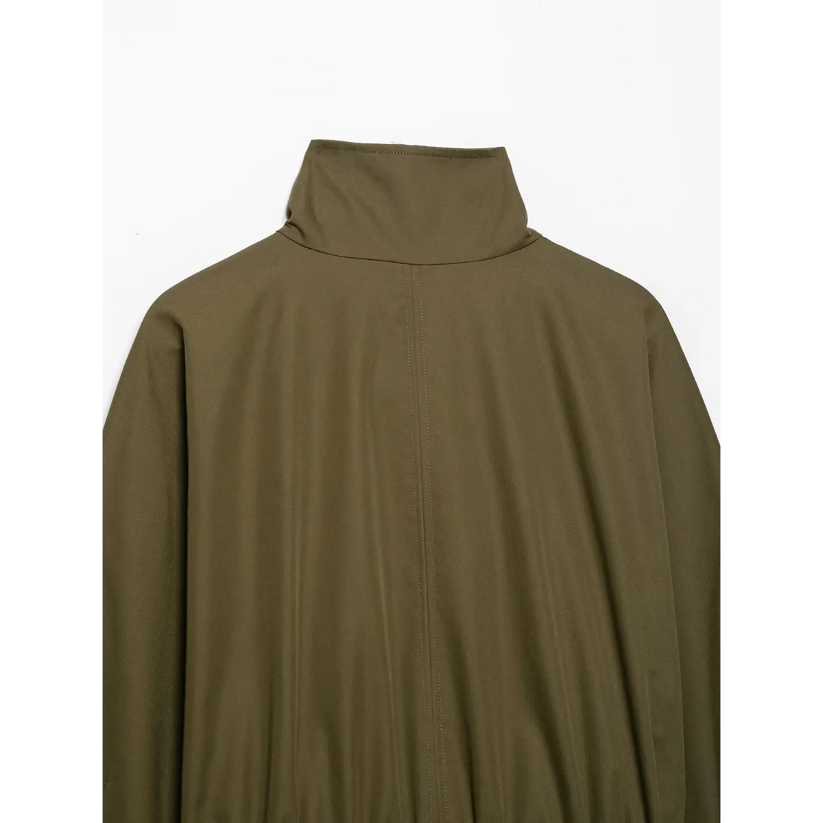 Close-up of back stand collar and center seam on olive green jacket