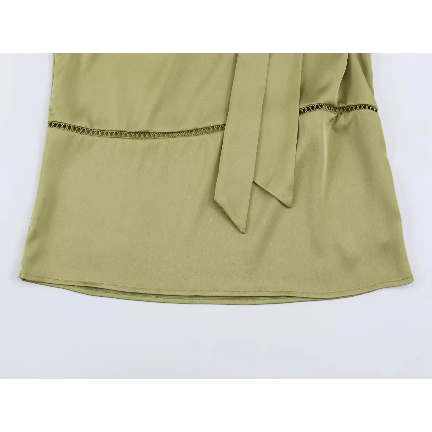 Whole bottom hem flat view, straight relaxed hemline, front overlapping tie sash