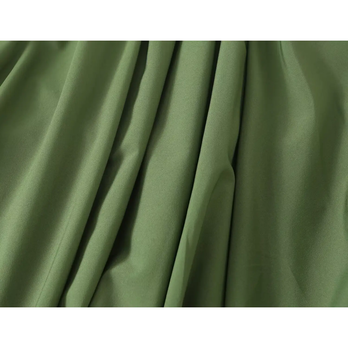 Close-up of draped satin feel fabric folds