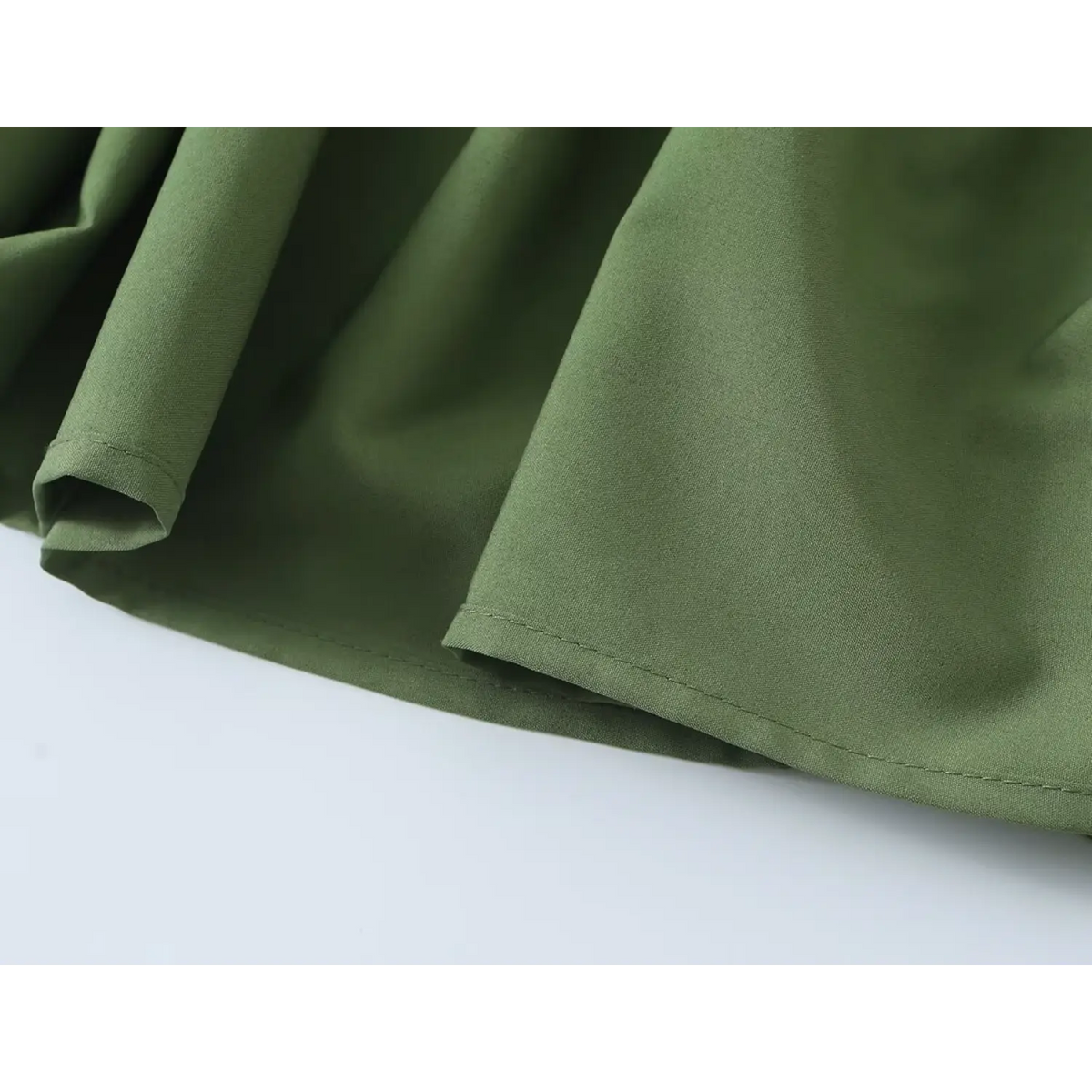 Close-up of high low ruffle hem