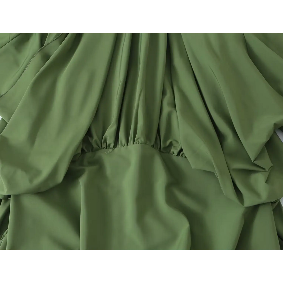 Close-up of gathered waist and overlay bodice