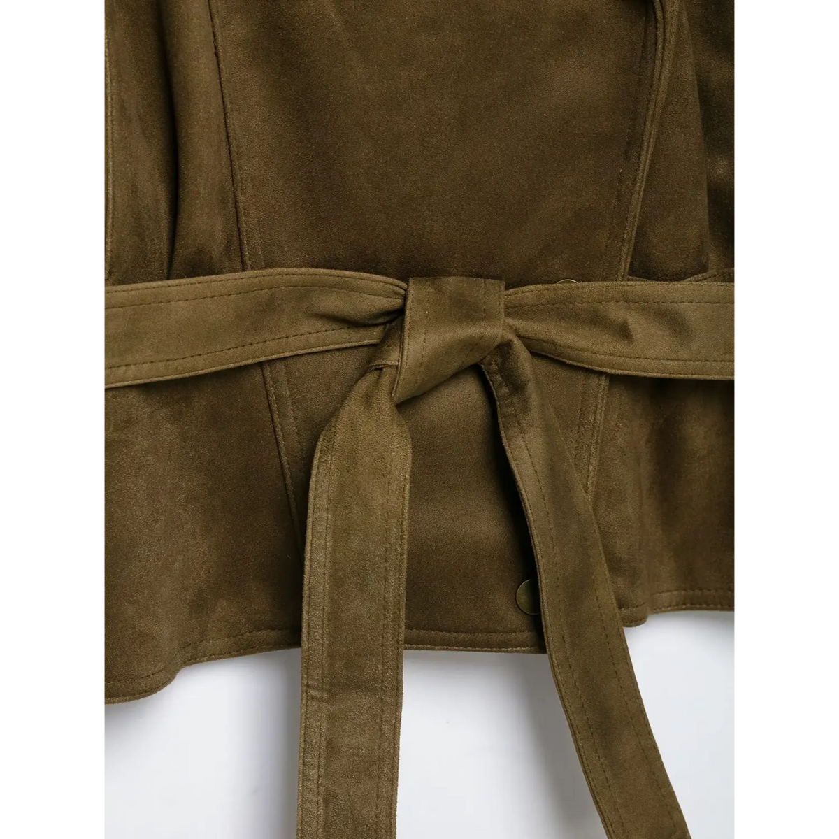 Close-up of self tie belt knot and press button