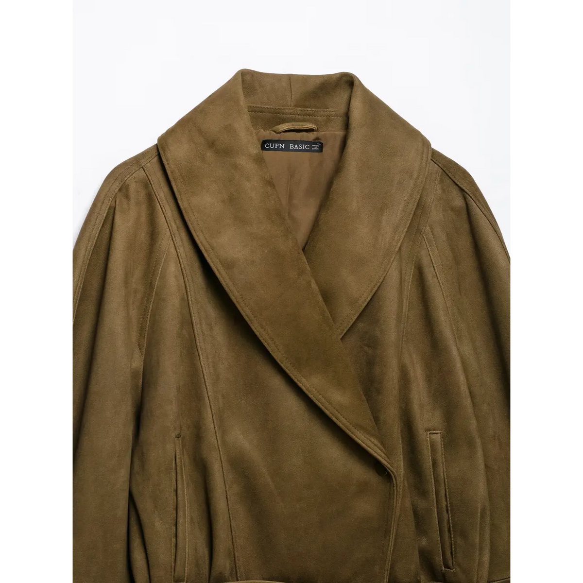 Close-up of shawl collar, inner label and slash pocket