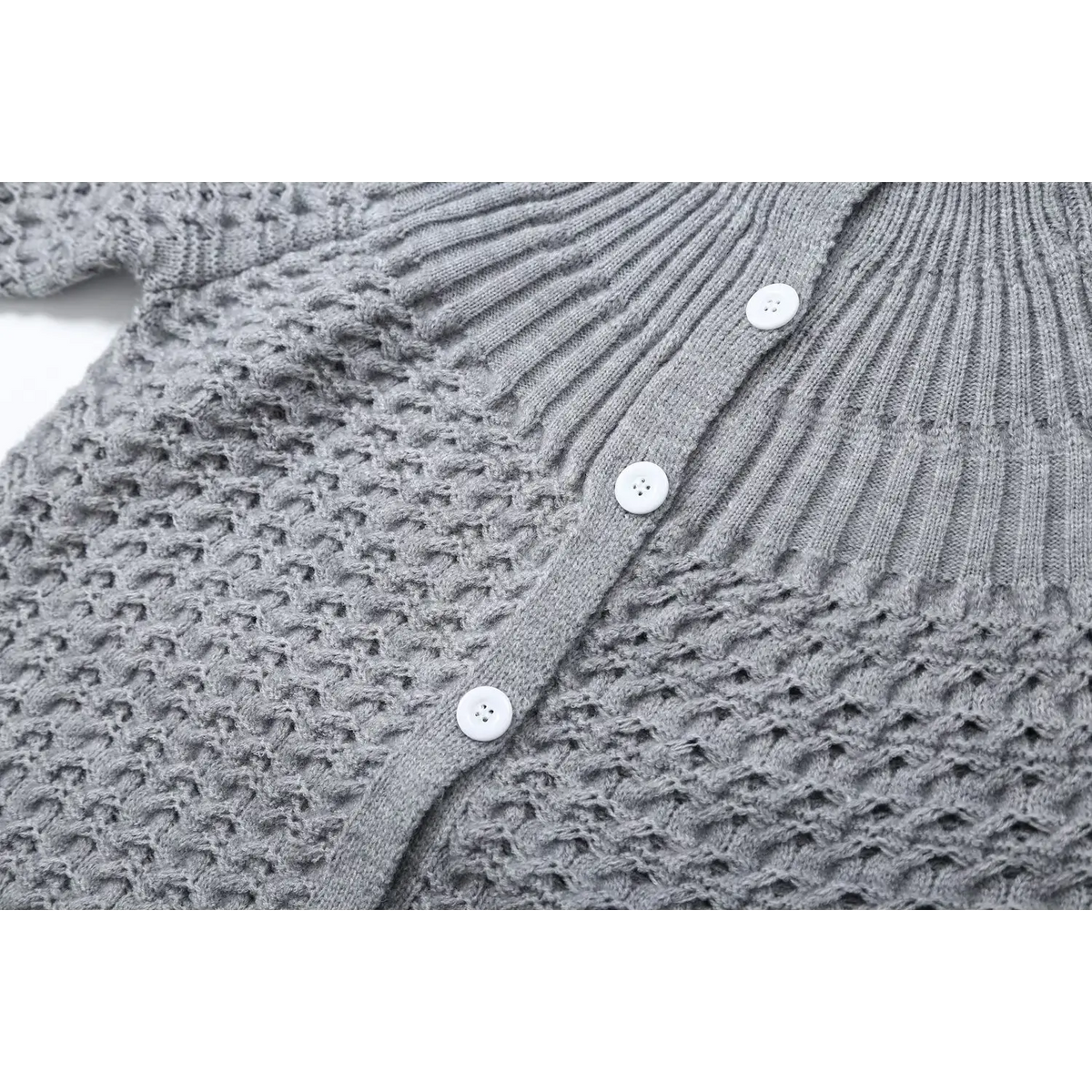 Close-up of gray white button placket