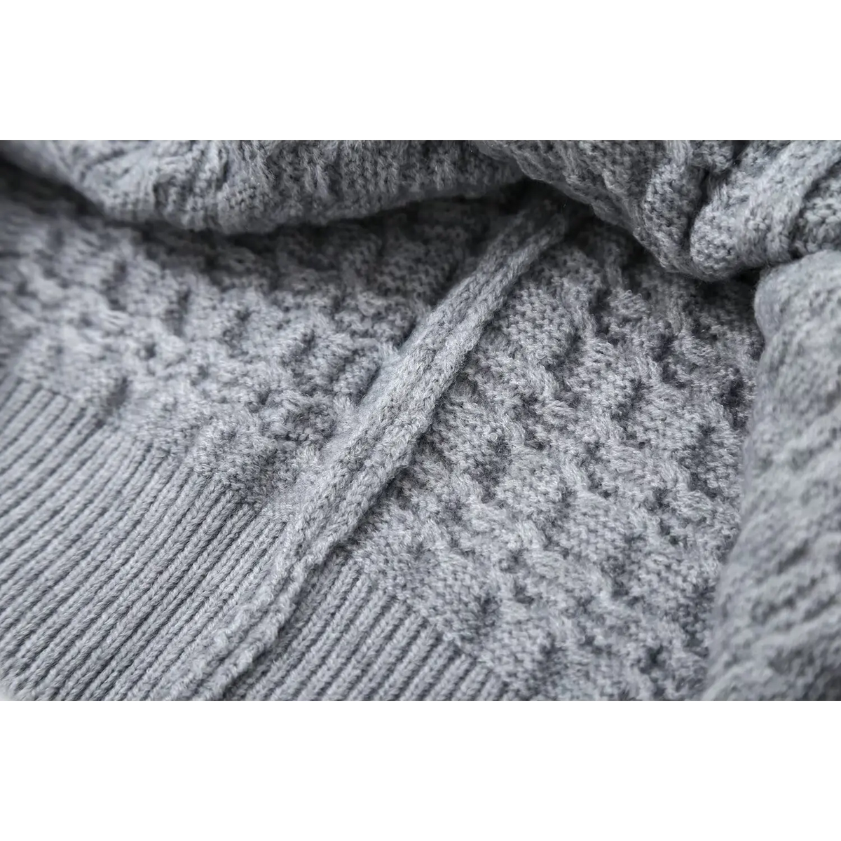 Close-up of gray layered openwork knit fabric