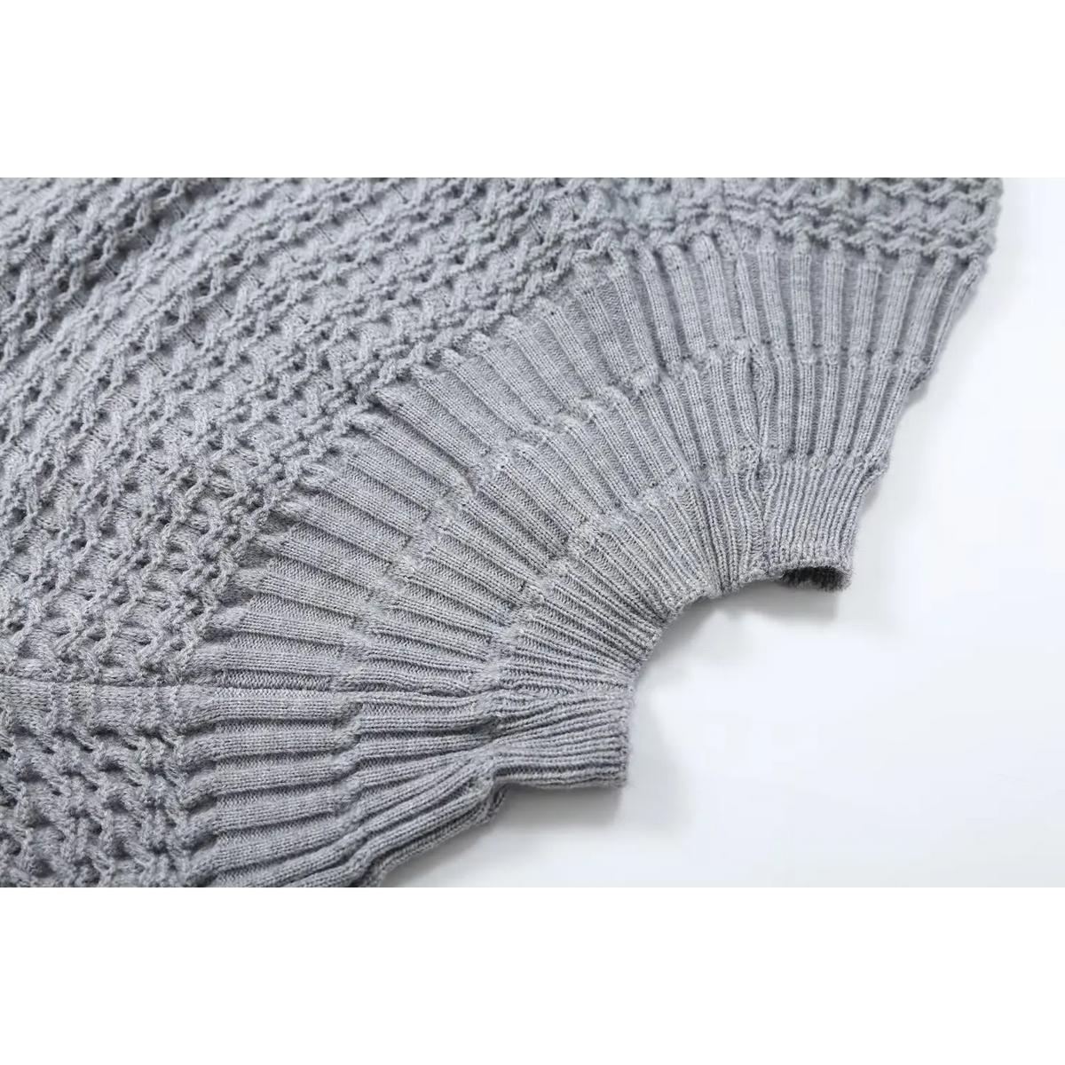 Close-up of gray ribbed yoke and sleeve