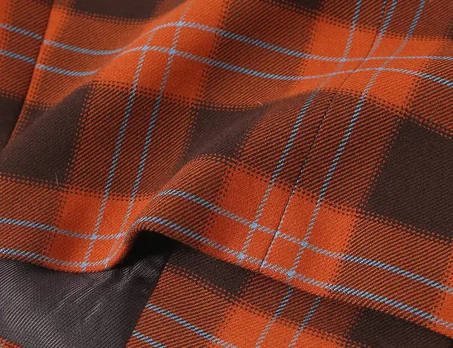Close-up of plaid fabric and brown lining