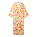 Front flat lay view of orange daisy floral print v neck kimono sleeve maxi dress