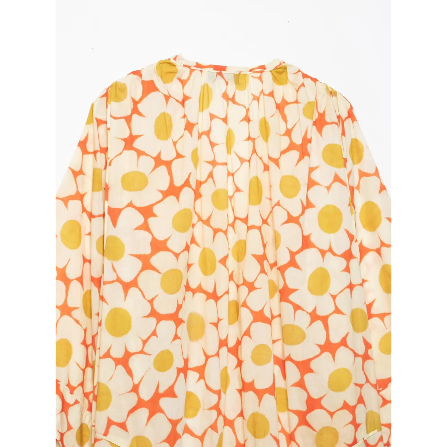 Close‑up of back gathered yoke on orange daisy floral maxi dress