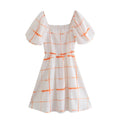 Orange grid print square neck smocked puff sleeve mini dress, front flat lay