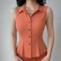 Daily front wearing photo, pointed lapel collar, front dark round button placket, waist shaping seams creating curvy silhouette, peplum flared hem, matched with orange bottoms, vintage casual matching style
