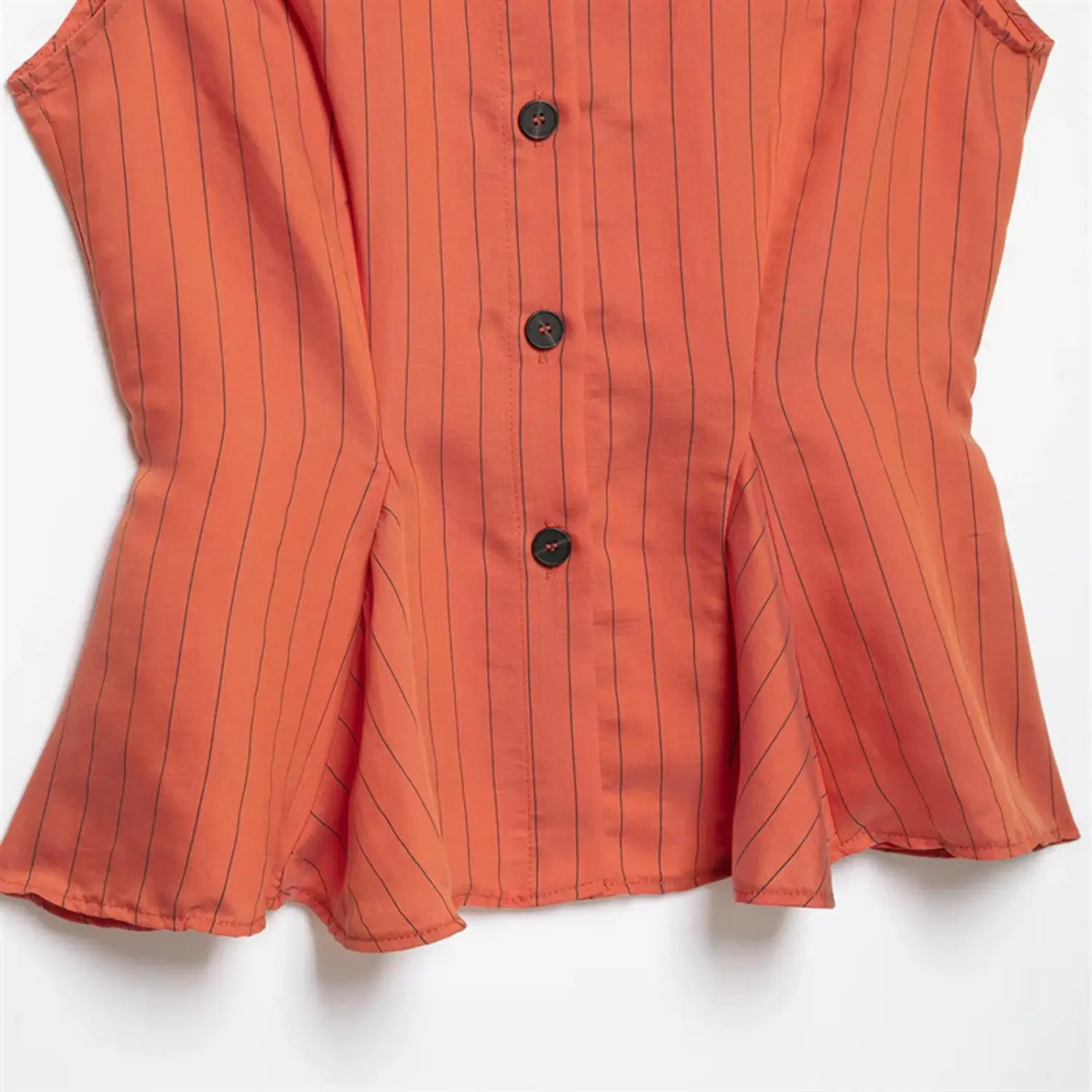 Front lower partial view, fitted waist shaping, flared peplum hem, vertical stripe pattern following body lines, natural fabric drape