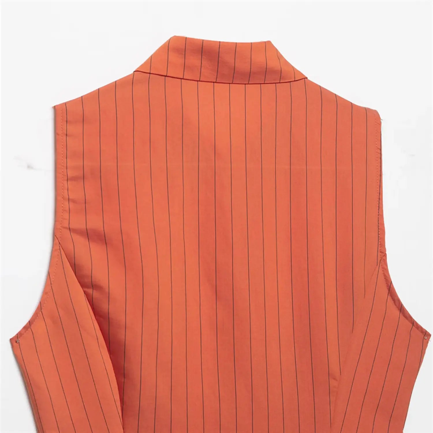 Full back flat lay view, plain back panel, vertical black stripes, back collar structure, clean side seam shaping
