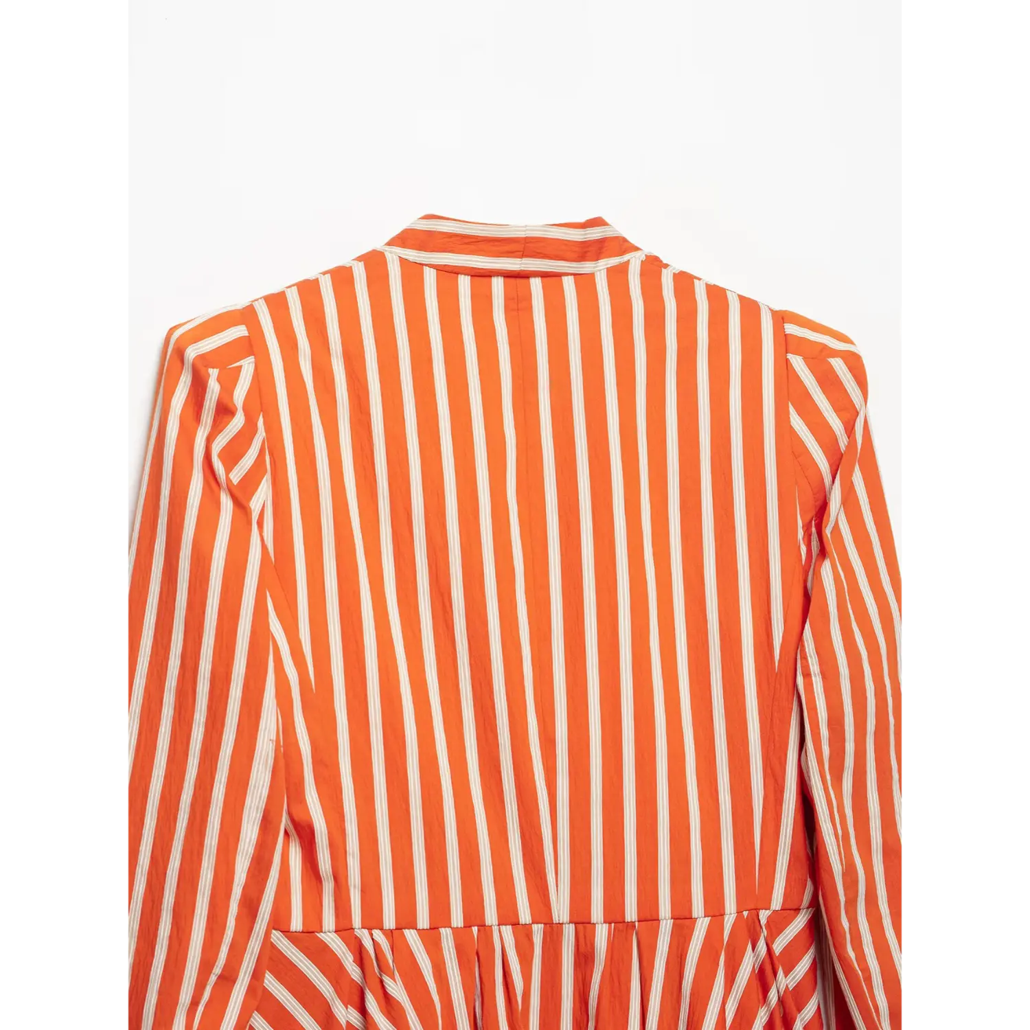 Full back flat view orange white striped peplum blazer