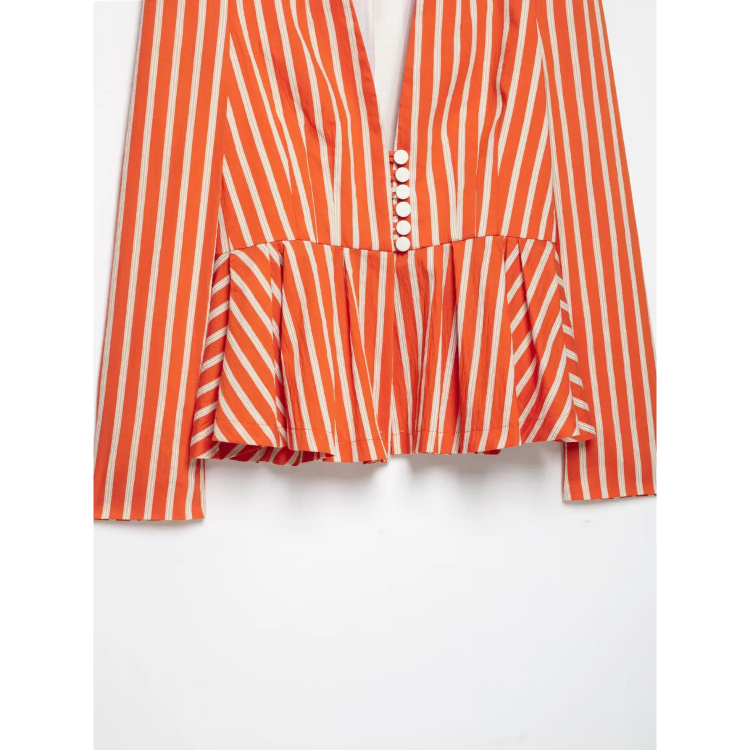 Waist and peplum section flat shot of orange white stripe long sleeve blazer