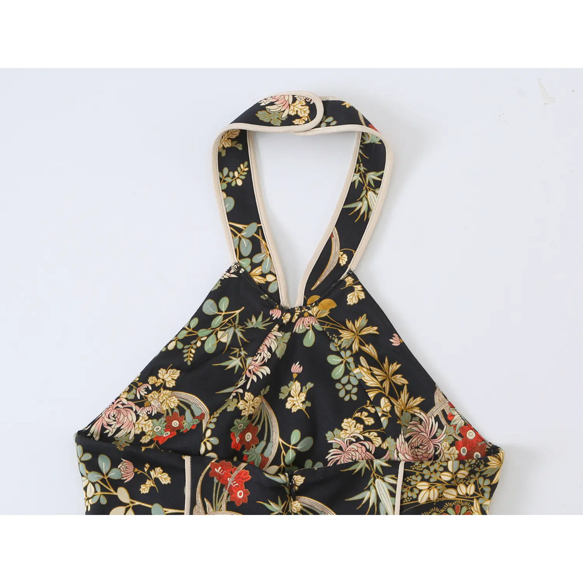 Close-up of back halter neck loop on oriental floral dress