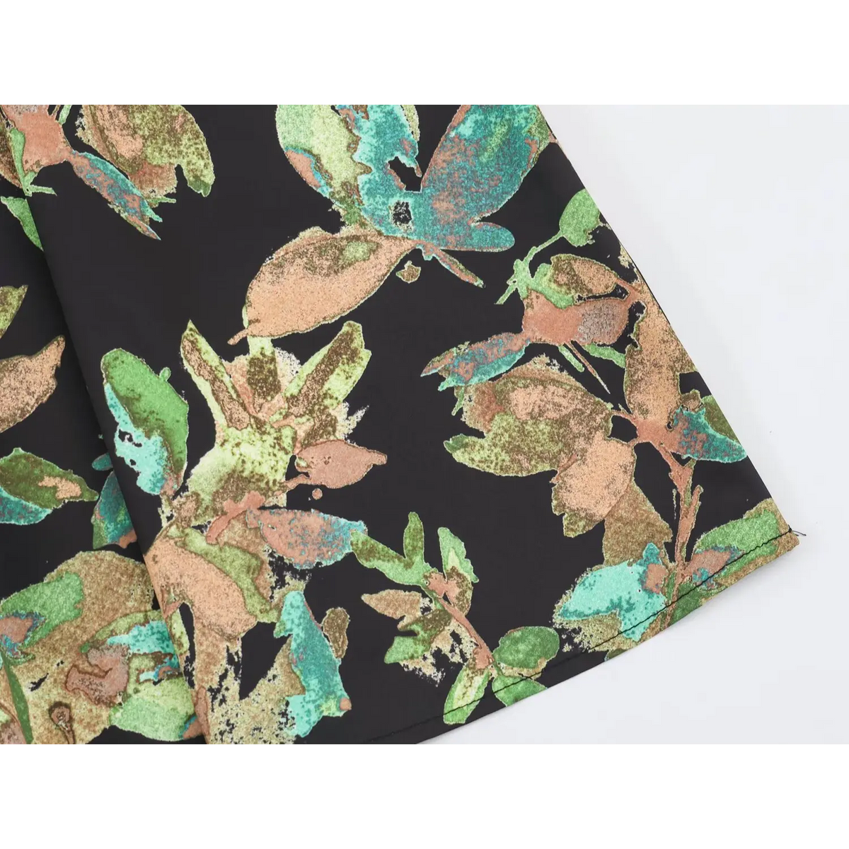 Close-up of skirt hem edge and floral print