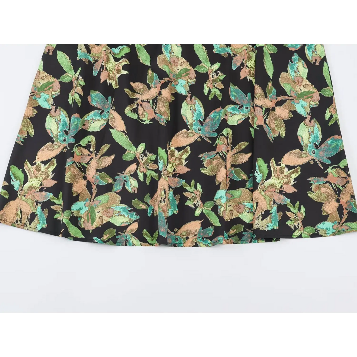 Close-up of A-line midi skirt and floral print