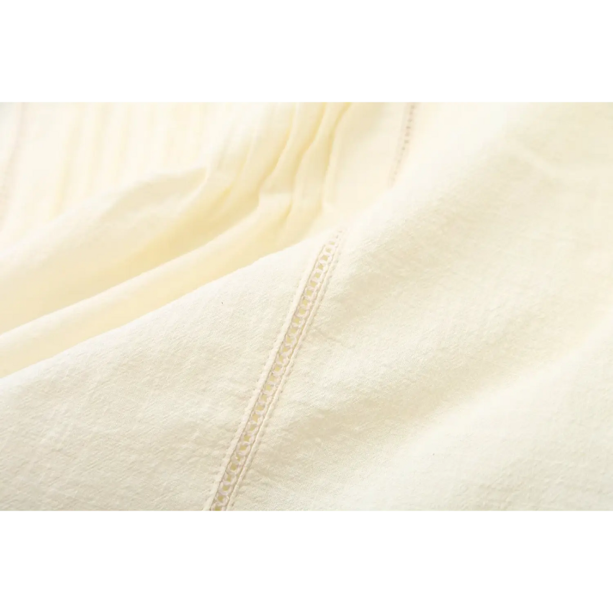 Close-up of ladder-stitched side seam