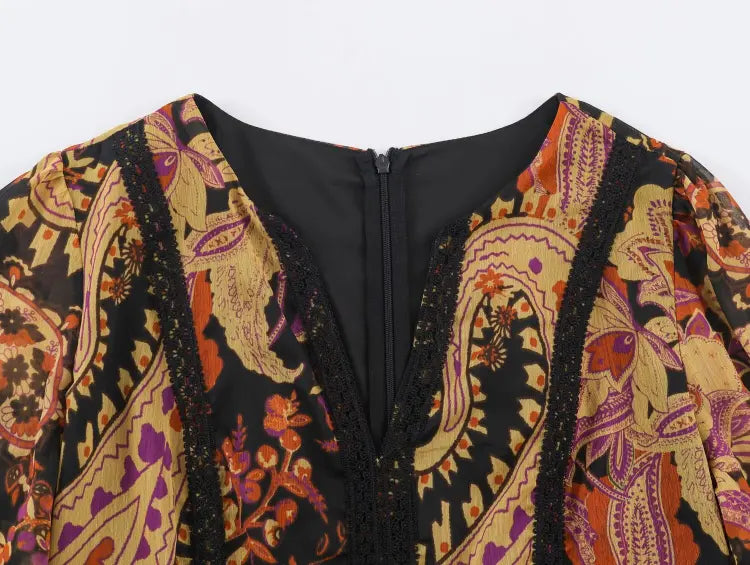 Close-up of V-neck lace trim and back zipper