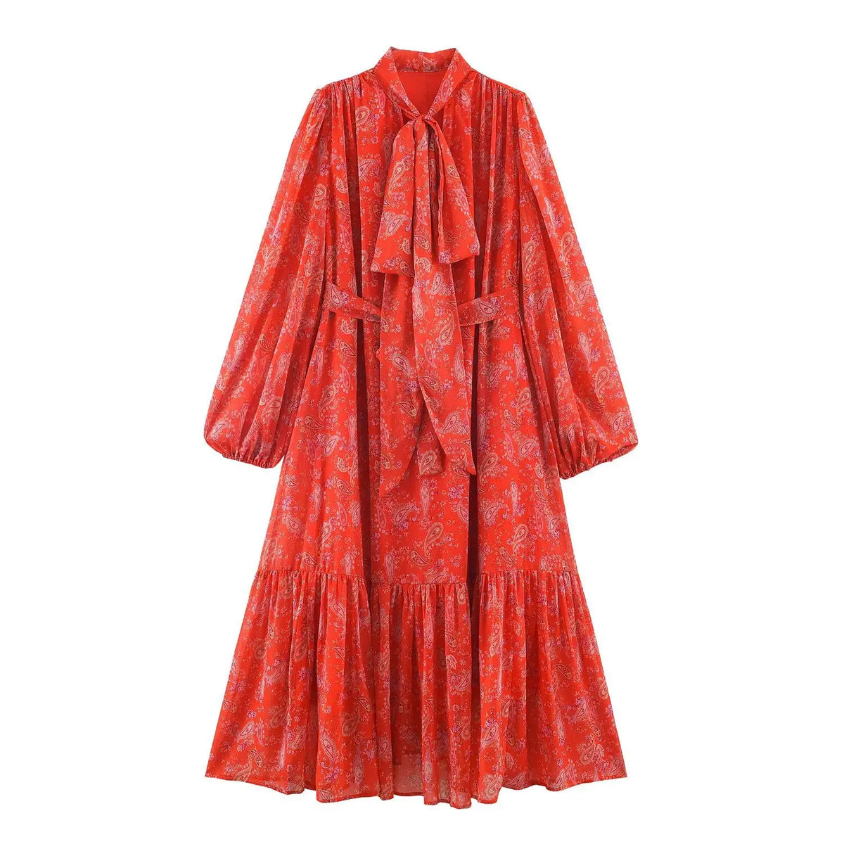 Front view of paisley print maxi dress, tie neck, long balloon sleeves, waist belt and ruffled hem