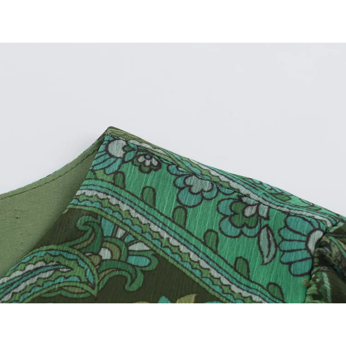 Close-up of neckline stitching and lining