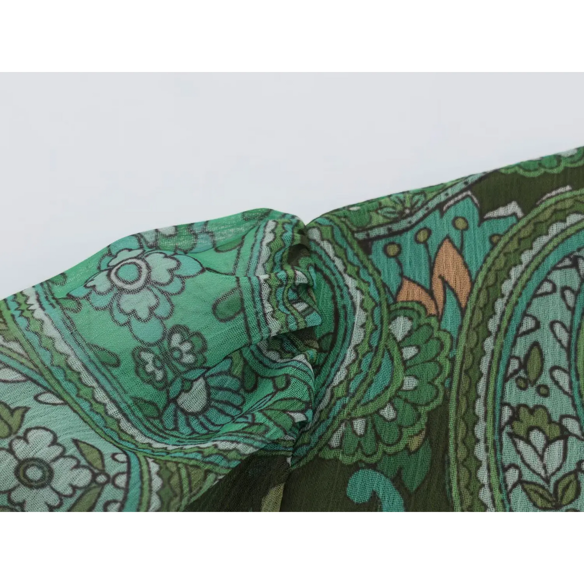 Close-up of sheer chiffon paisley print fabric