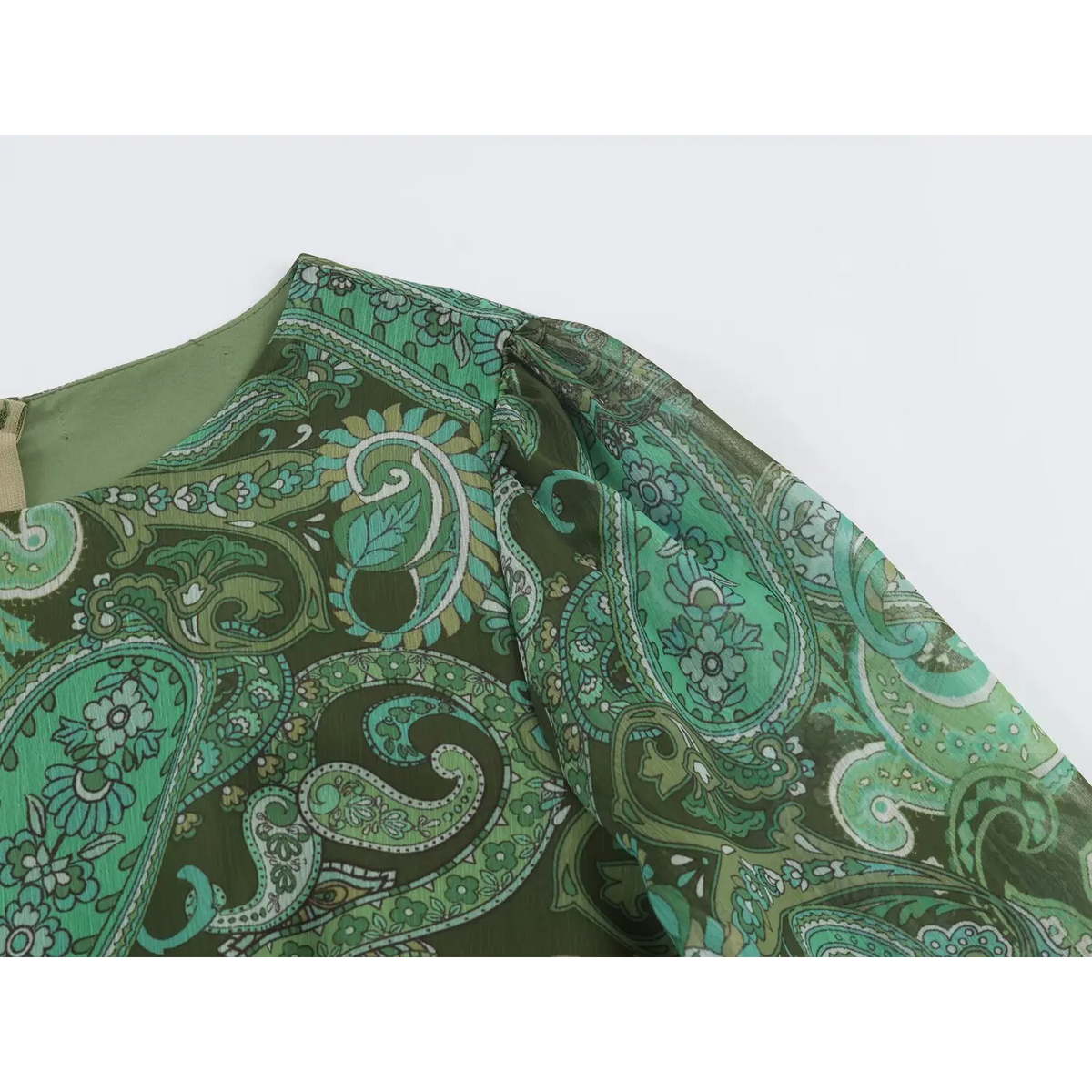 Close-up of shoulder seam and gathered puff sleeve