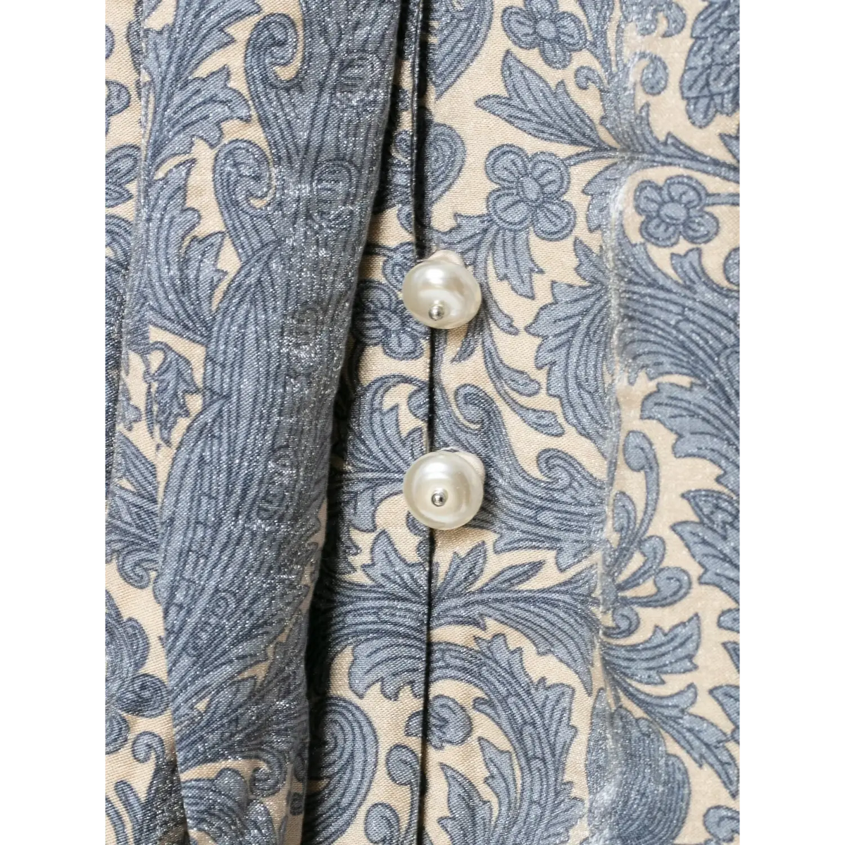 Close-up of pearl button placket