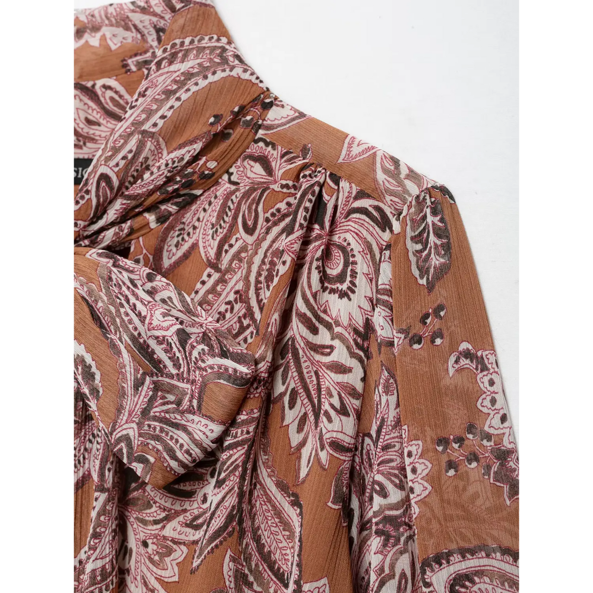 Close-up of shoulder gather and paisley print