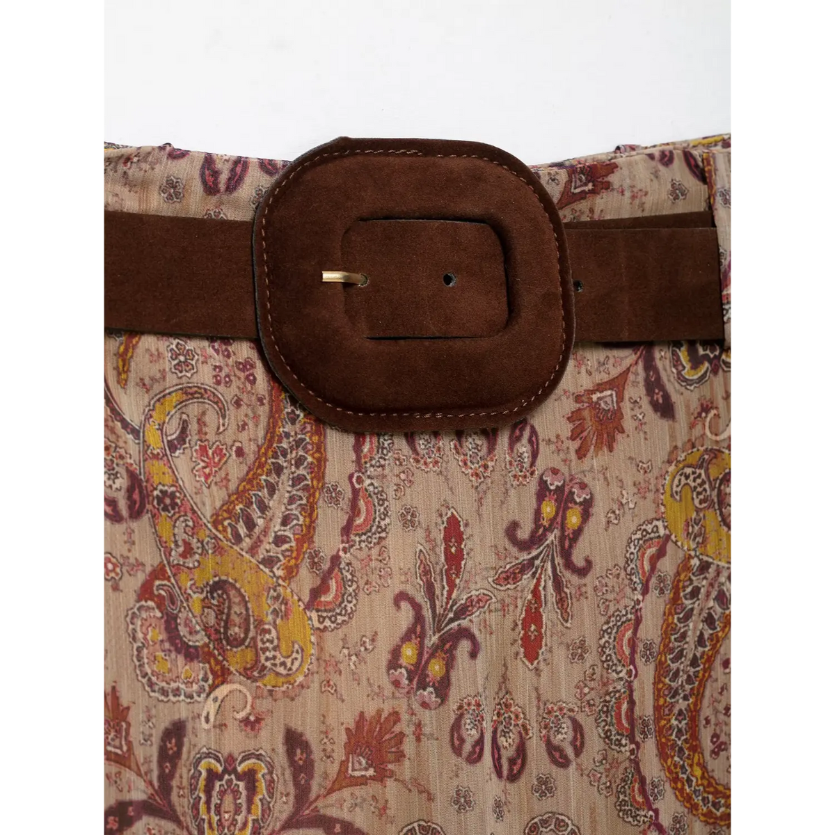 Close-up of suede square buckle detail