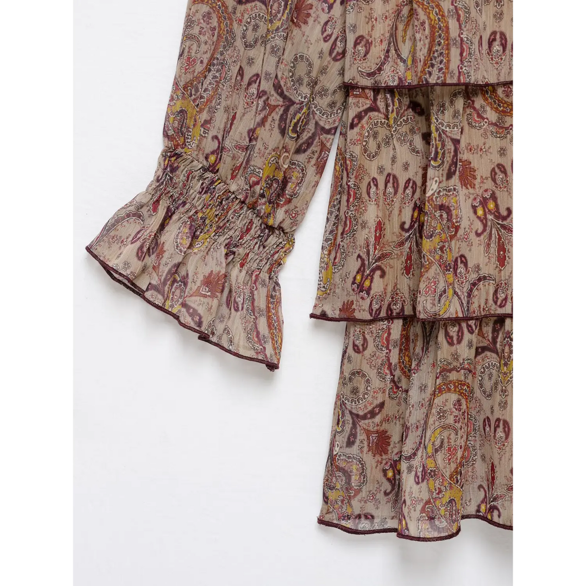 Close-up of ruffle cuff and tiered detail
