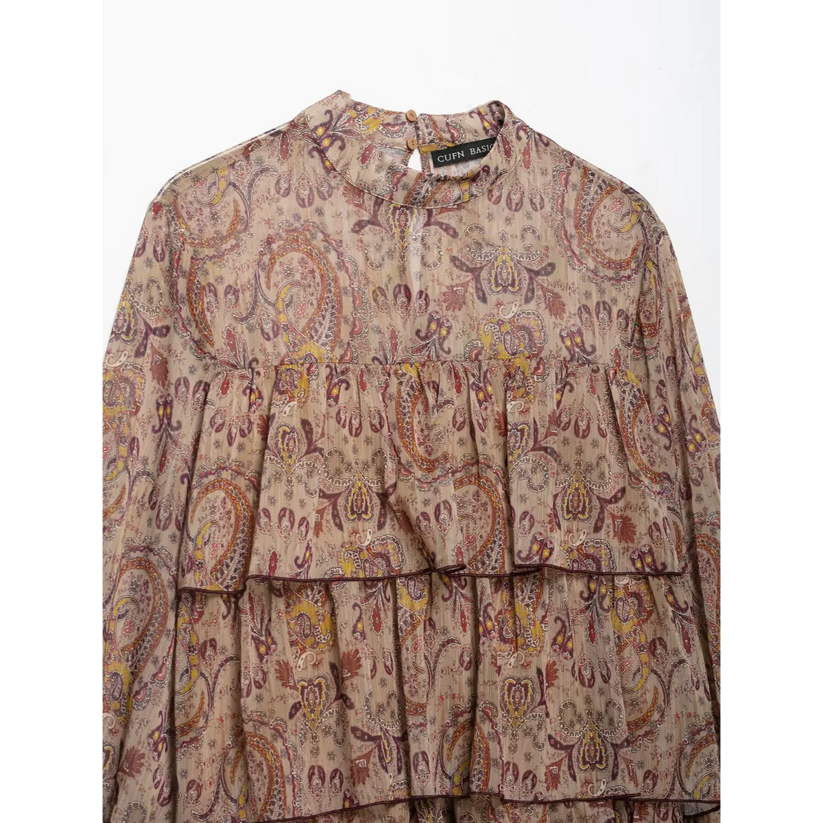 Close-up of high neckline and tiered ruffles