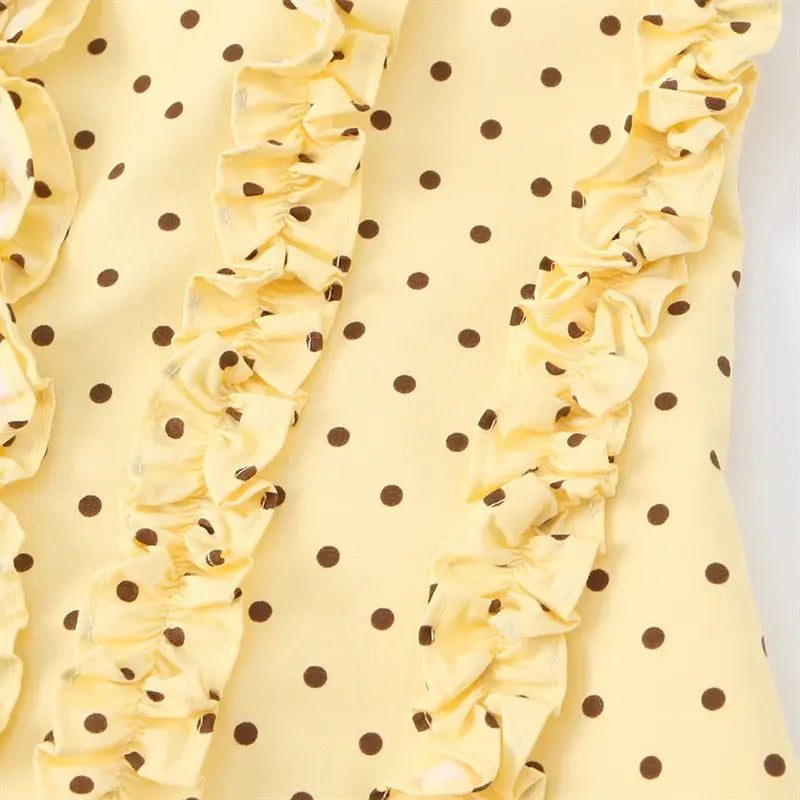 Side vertical double ruffle panel closeup, gathered frill stitching construction on dotted camisole