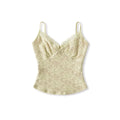 Full front shot of the pale yellow lace camisole, showing the scalloped V-neck, adjustable straps, and fitted silhouette.