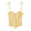 Full front flat photo pale yellow dotted camisole, sweetheart ruffle neck, vertical front ruffle placket, fitted waist tank
